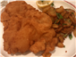schnitzel and fried potatoes